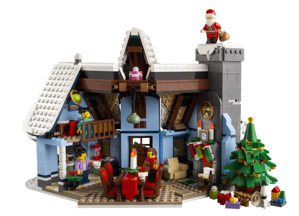 Started my Lego Christmas village and it's looking great so far I